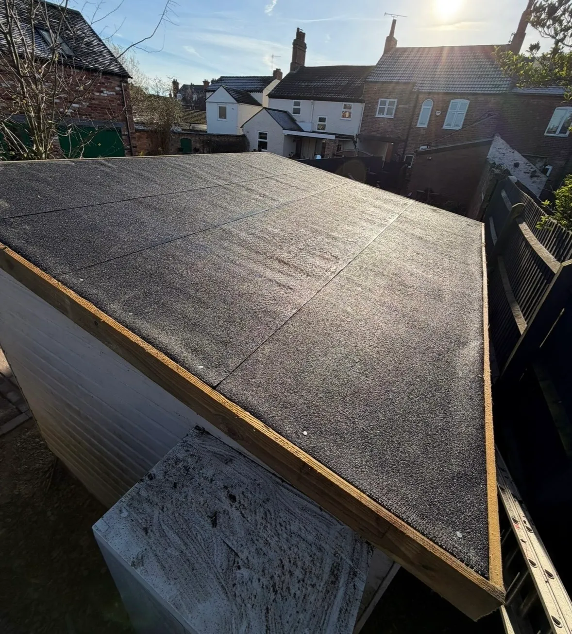 Shed with its roof replaced and re-covered