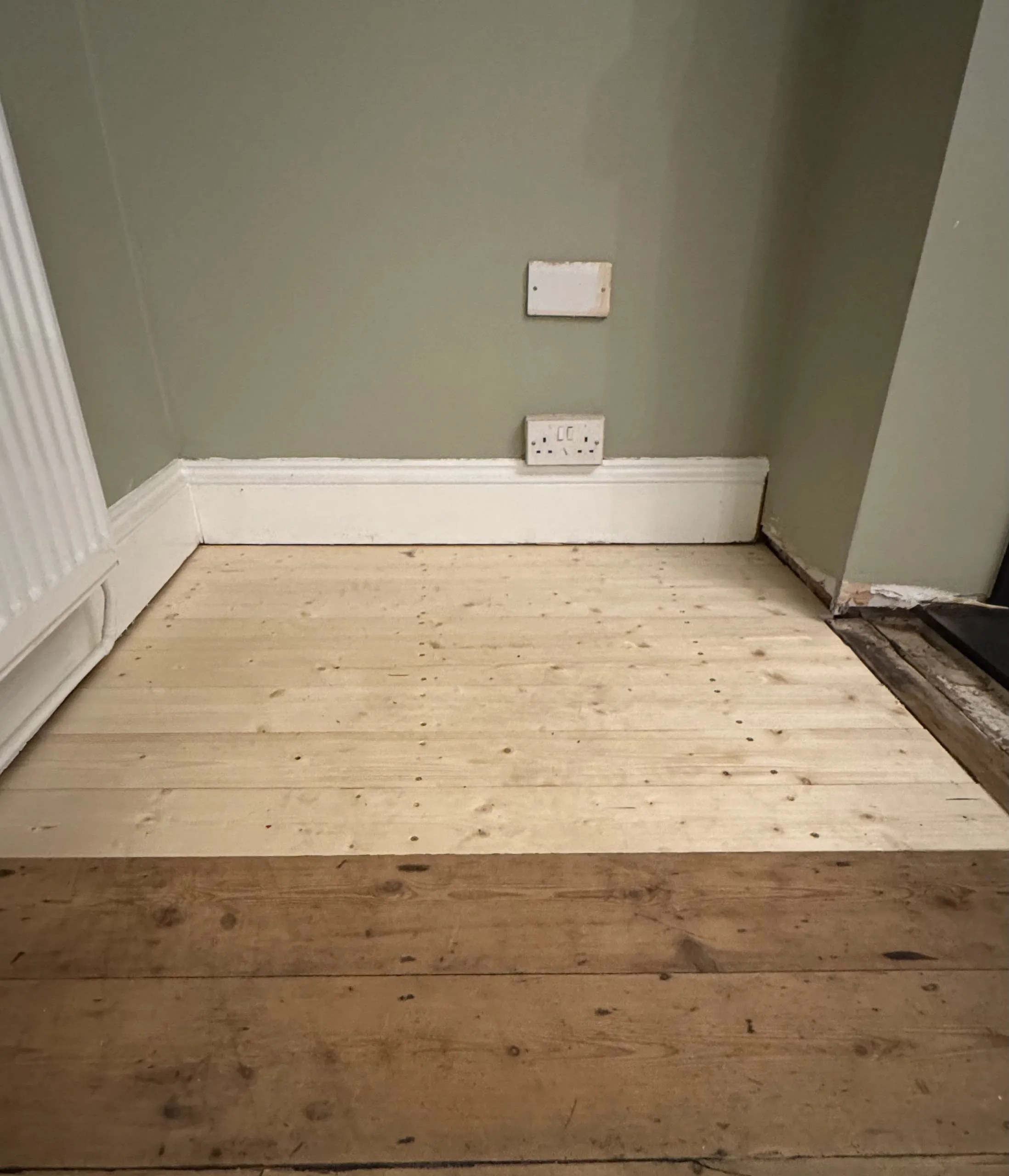 Repaired floorboards in an Ashby property, levelled and ready to cover