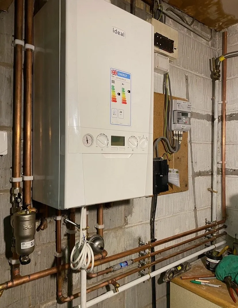 Plumbing installation fitted neatly to a wall