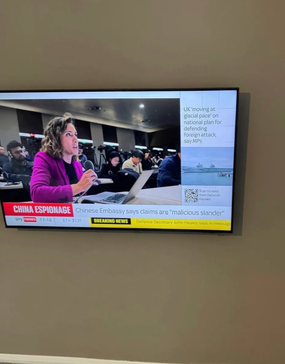 Wall-mounted television running with all cabling hidden behind the wall