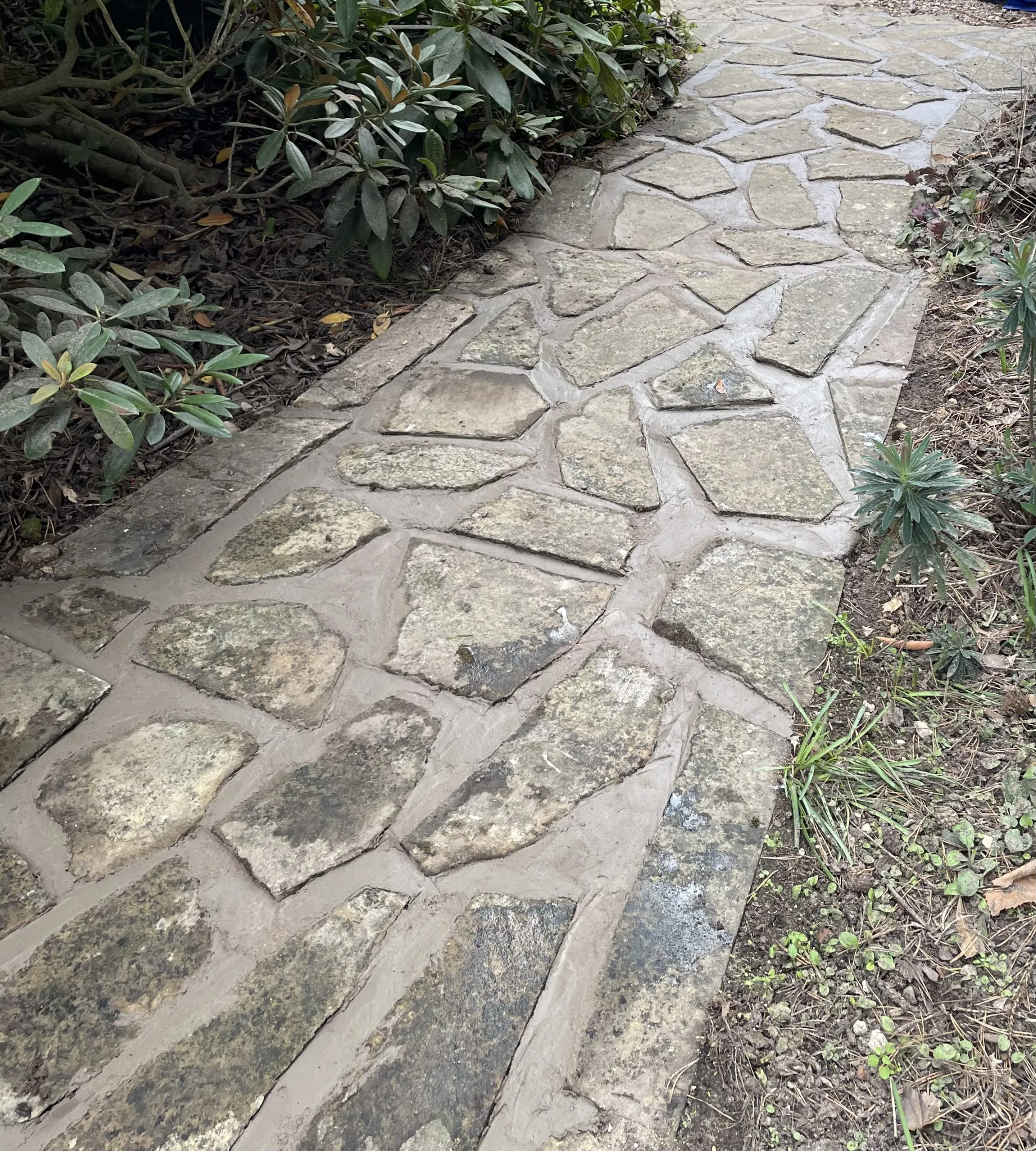 Crazy paving patio restored across the full area after repointing