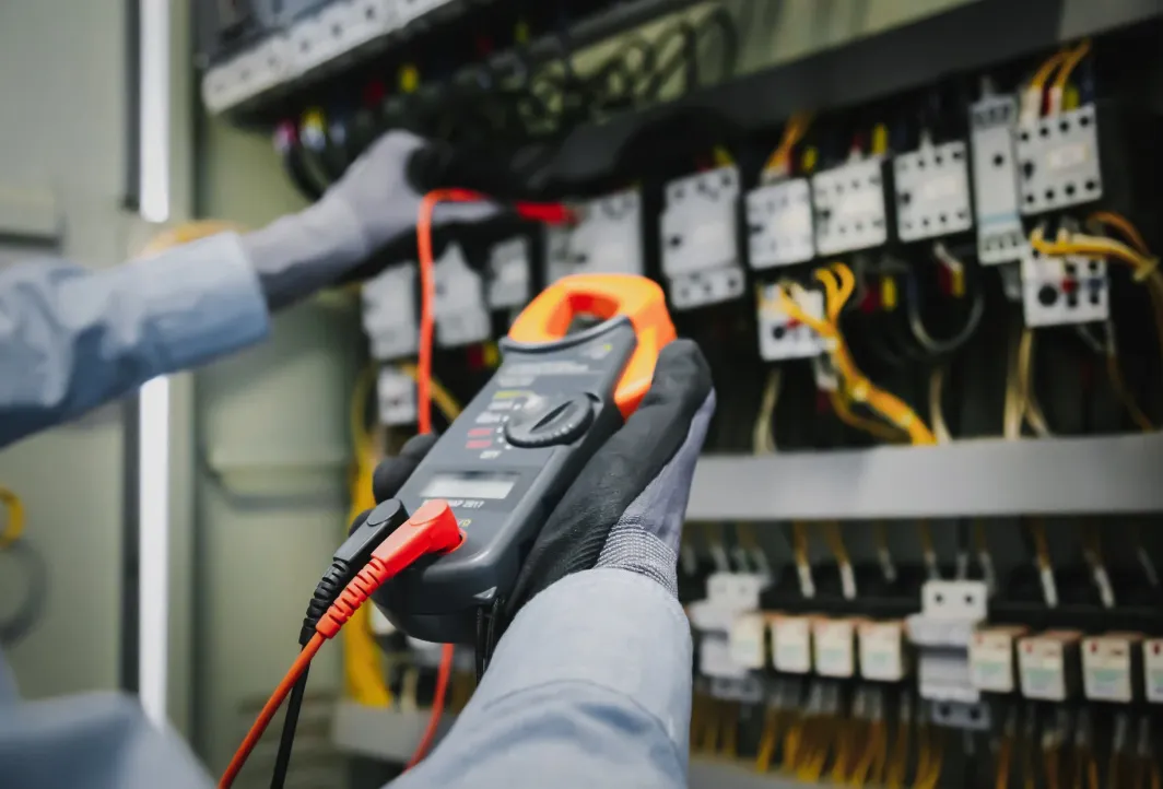 Electrician working on a consumer unit